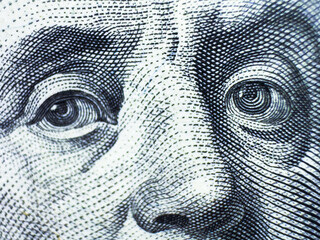 Benjamin Franklin's look on a hundred dollar bill. Benjamin Franklin portrait macro usa dollar...