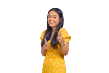 Portrait of smiling young Asian woman pointing finger at copy space isolated on transparent background