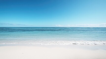 Obraz premium A beach with a clear blue ocean