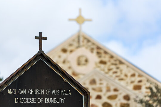 Anglican church with cross and sign