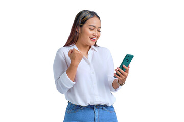 Excited young Asian woman using mobile phone gesturing yes with raised fist reacting to online news...