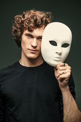 holding mask man