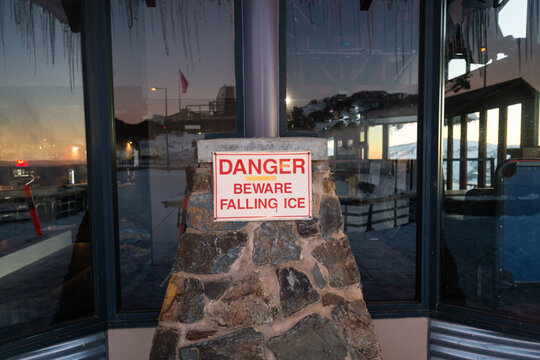 sign reading danger falling ice