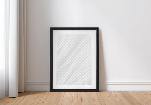 Framed Poster Mockup Against White Wall