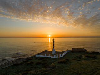 Faro del puerto de Mahon en Menorca al amanecer, Islas Baleares