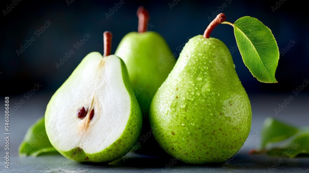 Poster three green pears with a leaf on top. the pears are fresh and ripe. the leaf on top of the pears add