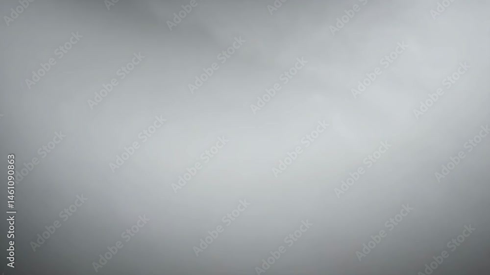 Aufkleber A white background with a greyish color. The background is very smooth and has no texture. There is no visible detail in the background