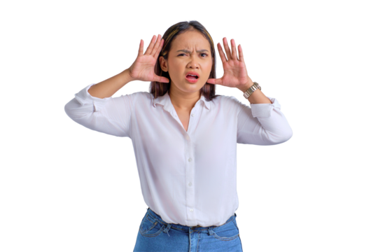 Anxious young Asian woman holding hands near his ears, listening to gossip isolated on transparent background