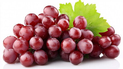 Fototapeta premium A bunch of freshly picked grapes on a table against white background