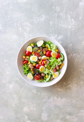 Salad with tuna, eggs, tomatoes, cucumbers and corn. Healthy eating. Diet.