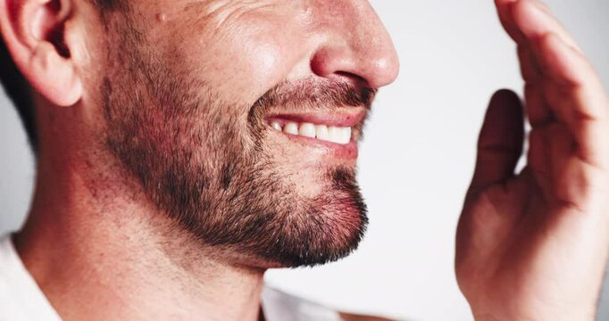 Happy man, mouth and smell with fresh breathe for oral care or cleaning on a white studio background. Male person, closeup or model with pleasant smile for dental hygiene, treatment or good odor