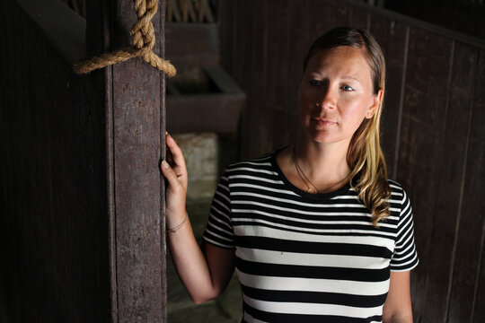 Blonde girl in dim light