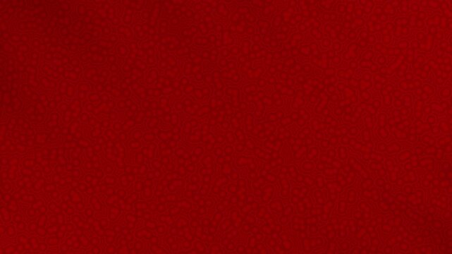 Dark red gradient swirls into an abstract pattern. circular movement resembling a cell.