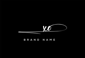 XO letter beauty handwriting vector logo.