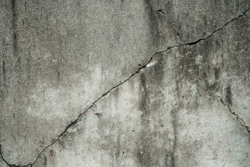 Fototapeta premium Concrete crack texture background texture. Grey crack wall 