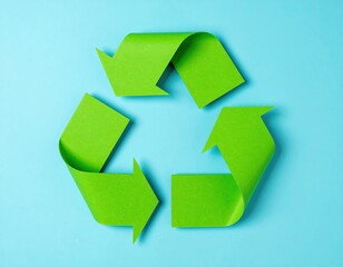 Obraz premium A vibrant green recycling symbol prominently displayed on a rich blue background, symbolizing sustainability and environmental awareness in a striking contrast.