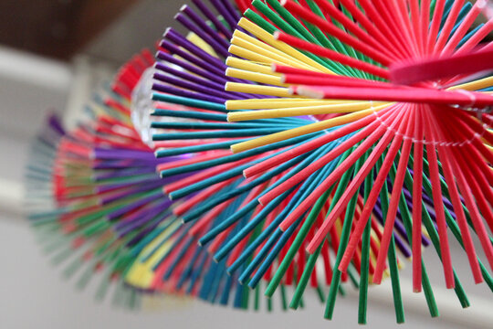 Looking down a colourful spiral of sticks