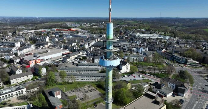 telecommunication tower in Velbert, nicknamed Telebert, aerial video. Broadcasting and radio signals. antenna, 5G, connectivity.