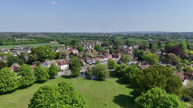 Writtle Village Essex UK pull back drone aerial reverse reveal