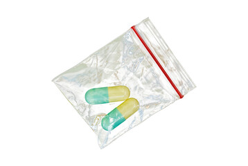 pills in plastic bag isolated on white background