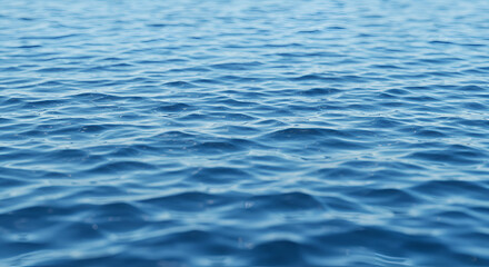 Naklejka premium Rippling blue water surface abstract