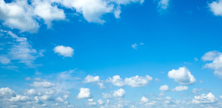 Fototapeta blue sky background with tiny clouds