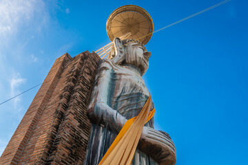 An ancient Buddha statue is housed at Wat Klang Khlong Khoi, a local temple in Ratchaburi, Thailand.