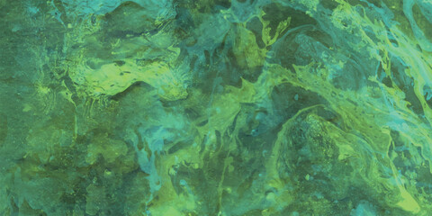 Abstract watercolor texture in shades of green and teal creating a serene and organic artistic design suitable for backgrounds and graphic elements