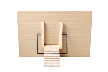 Back side of wooden stand for a book on white background, Reading stand