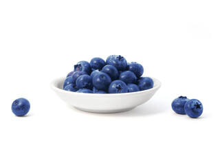 Blueberries in white bowl isolated on white background