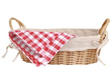 Wicker basket with kitchen red checkered towel isolated on white background