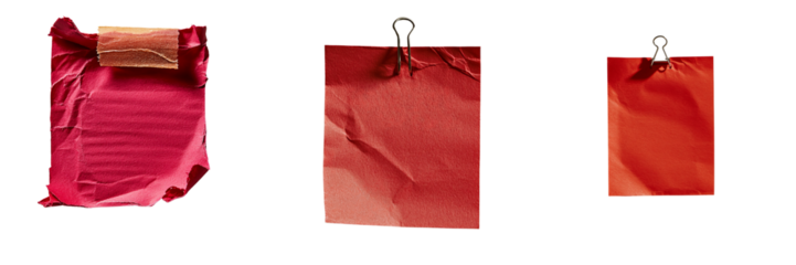 Png of Three crumpled red paper notes hanging on clips, showcasing varying sizes and textures, evoking a creative workspace feel.
