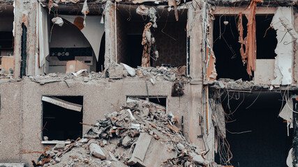 ruined street and destroyed houses in Ukraine