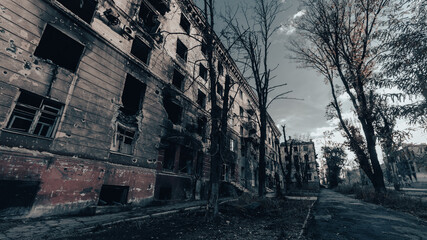 ruined street and destroyed houses in Ukraine