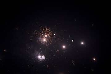 Fototapeta premium Brilliant firecracker explosion lighting up the dark night sky