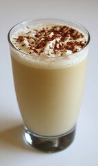 Iced coffee drink with whipped cream and cocoa