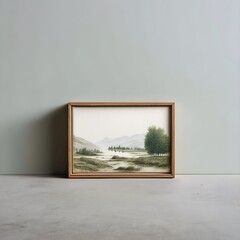 Fototapeta premium Display serene landscapes in miniature landscape painting framed in simple wood for elegant artistic accents