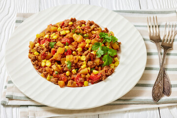 ground beef stew of potatoes and chopped tomatoes
