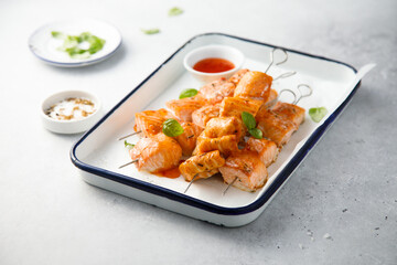 Salmon skewers with sweet chili sauce