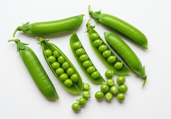 Fresh green peas in pods and loose on a white surface, top view
