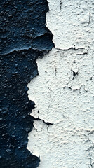 Obraz premium Peeling paint on a wall, contrasting dark and light colors