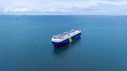 Aerial view RoRo Ship business logistic and transportation sea freight, Cargo and RoRo ship Roll On Roll Off ship at sea, Car carrier ship RO-RO Roll on Roll off.