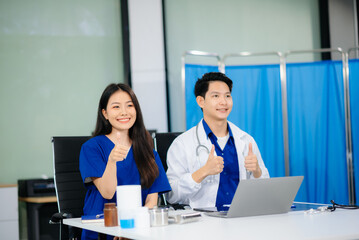 Professional healthcare team consultation a doctor and nurse collaborating in a clinic, discussing...