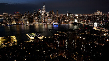 Fototapeta premium Night View Of Downtown New York At Manhattan In New York United States. City At Night Landscape. Illuminated Downtown. Downtown New York At New York United States. Empire State Building. 