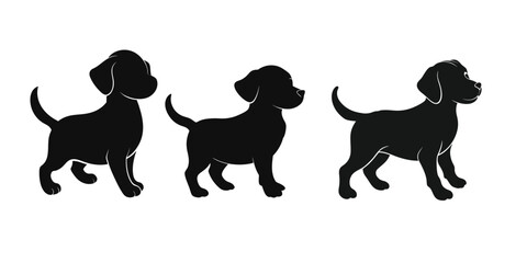 silhouette of a playful labrador puppy holding.eps
