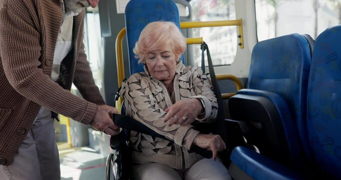 Wheelchair, belt and bus with elderly people for safety, handicap policy and helping. Security, public transportation or love with senior couple with a disability or strap for journey or metro travel