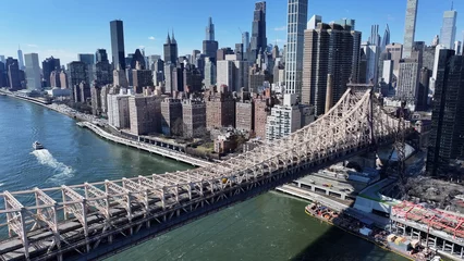 Fototapete Queensboro Bridge At Manhattan In New York United States. Freeway Road Scene. Beautiful Cityscape. Queensboro Bridge At New York United States. Highrise Buildings Landscape.  © bydronevideos