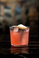 Elegant luxury cocktail in front of dark background