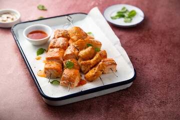 Salmon skewers with sweet chili sauce