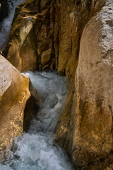 Mountain stream rushing through rocks